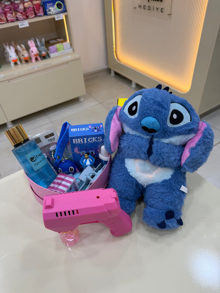 Pembe Mavi Masalı – Sevimli Stitch Peluşlu & Pembe Köpük Tabancalı Hediye Seti Pofidik Hediye